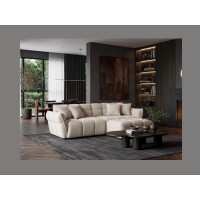 Pouf MOONI beige champagne vu avec le canapé de la même collection
