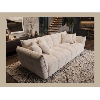 Canapé et pouf MOONI beige clair avec le canapé vu sur le côté