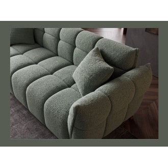 Zoom sur l'assise du canapé de l'ensemble du canapé et pouf MOONI vert sauge