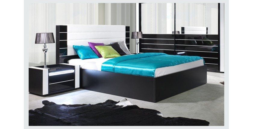 Lit double 180 cm avec option coffre LINA. Coloris noir et blanc brillant avec une finition en simili cuir. Sommier inclus