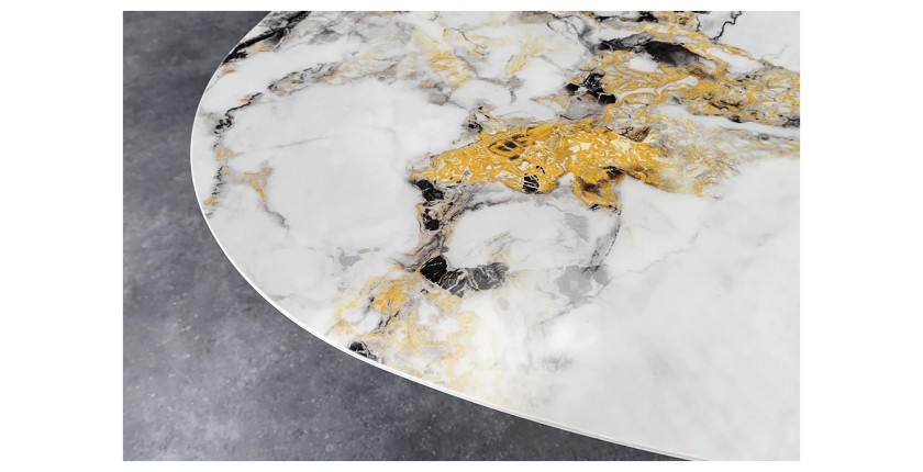 Zoom sur le plateau de la table AERIS bronze