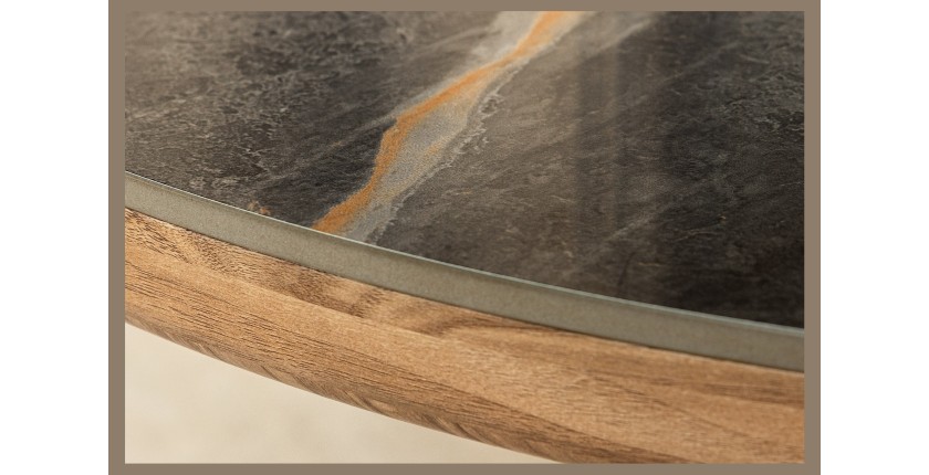 Zoom sur le côté du plateau de la table LUMEA ovale noir et bois