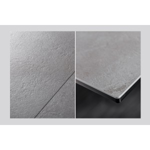 Zoom sur le plateau de la table LIXOR grise extensible