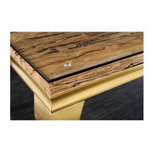Zoom sur le plateau de la table VELENA avec plateau bois et pieds dorés