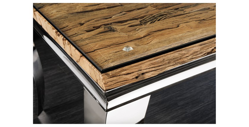 Zoom sur le coin de la table VELENA avec plateau bois et pieds argentés