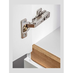 Zoom sur le système d'ouverture de la colonne de rangement ASKA blanche et bois