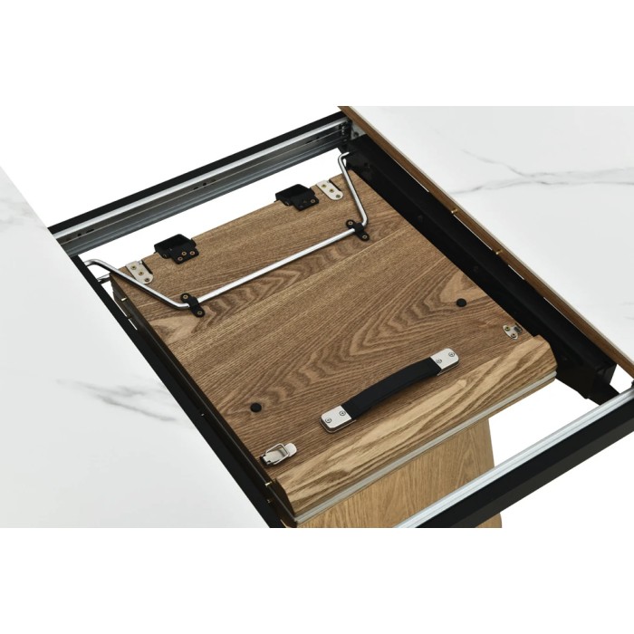 Zoom sur le système d'extension de la table LUMEA blanche ovale 160cm