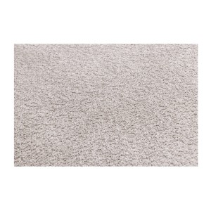 Zoom sur la texture bouclé du pouf KALIA en velours champagne