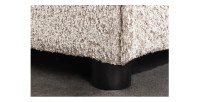 Zoom sur le pied du pouf KALIA en velours champagne bouclé