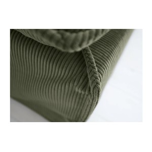 Zoom sur la tranche du pouf KALIA en tissu côtelé vert