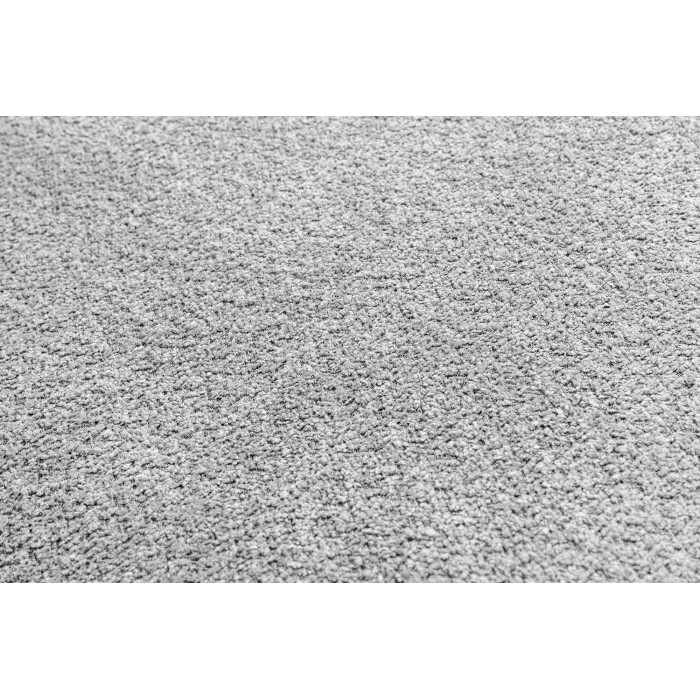 Zoom sur la texture du canapé d'angle et du pouf KALIA en tissu bouclette gris