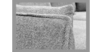 Zoom sur l'accoudoir du canapé d'angle KALIA en tissu bouclette gris