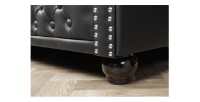 Zoom sur l'un des pieds du canapé 3 places EDGAR noir