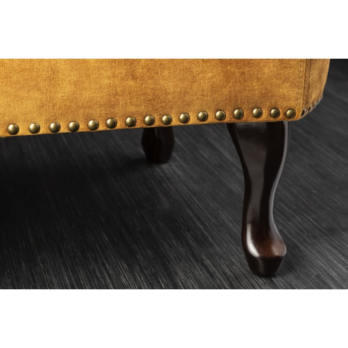 Zoom sur l'un des pieds de la méridienne EDGAR jaune moutarde