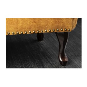 Zoom sur l'un des pieds de la méridienne EDGAR jaune moutarde