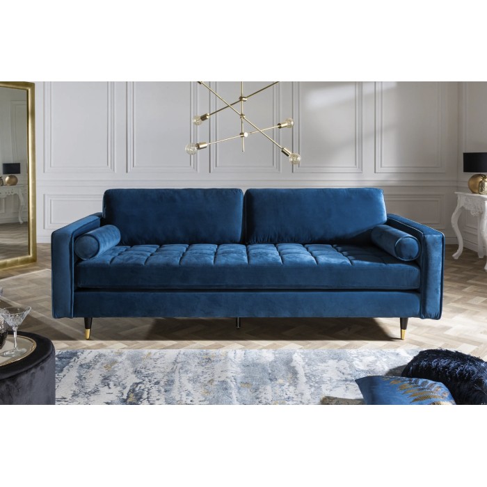 Hoekbank KOLIRI blauw - Design fluwelen bank met bijpassende poef