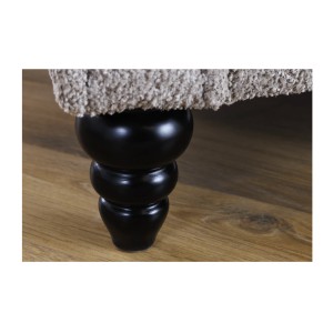 Zoom sur le pied du canapé convertible droit en tissu bouclette beige de la collection MILES