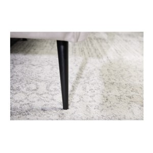 Zoom sur l'un des pieds du canapé droit DANNA blanc