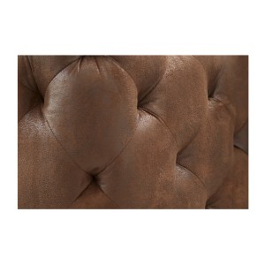 Zoom sur les motifs de l'accoudoir du canapé droit VELENA marron