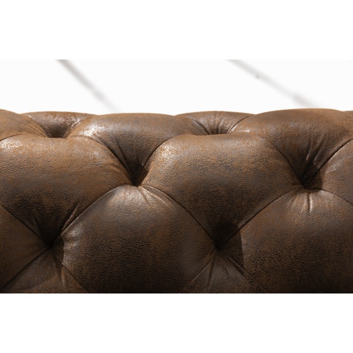 Zoom sur le dossier du canapé dans la configuration canapé d'angle + pouf VELENA marron
