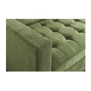 Zoom sur l'accoudoir gauche du canapé avec angle réversible CITY vert