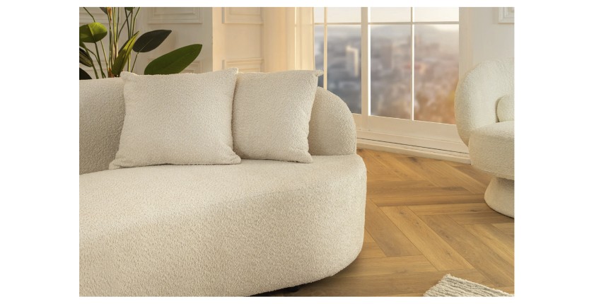 Zoom sur le côté du canapé SOREN blanc