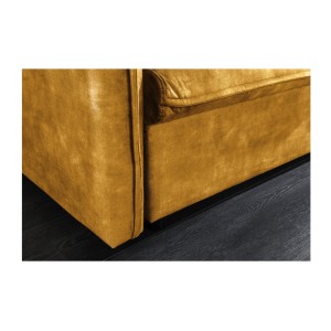 Zoom sur la tranche du canapé convertible CALDERO jaune moutarde