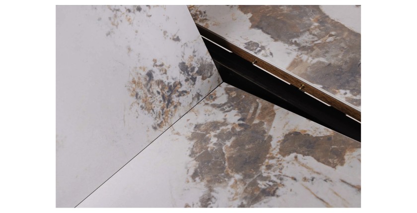 Zoom sur le système d'extension du plateau de la table extensible LUMEA avec plateau en céramique et pied en bois de noyer