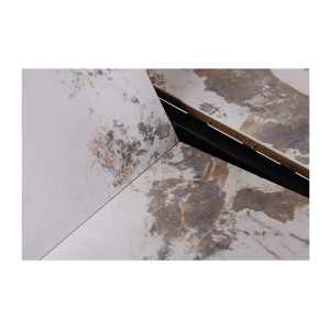 Zoom sur le système d'extension du plateau de la table extensible LUMEA avec plateau en céramique et pied en bois de noyer