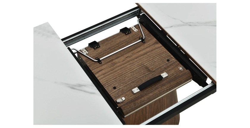 Zoom sur le système d'extension de la table LUMEA en bois de noyer et plateau effet marbre blanc
