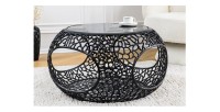 Table basse ronde avec niche centrale noire METRIX mise en situation
