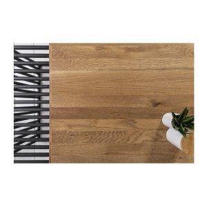 Zoom sur la jonction entre le plateau en bois et les détails métallique de la table ABITTA