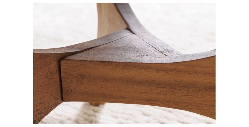 Zoom sur le détail des pieds de la table basse ronde ABITTA en bois d'acacia