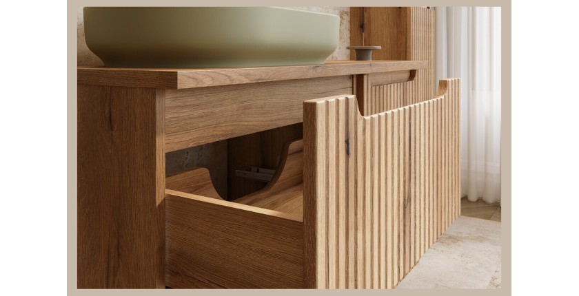 Zoom sur l'ouverture d'un des tiroirs du meuble sous vasque aspect chêne clair collection VANO