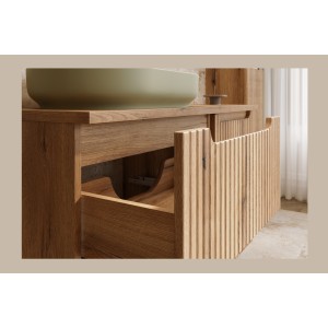 Zoom sur l'ouverture d'un des tiroirs du meuble sous vasque aspect chêne clair collection VANO