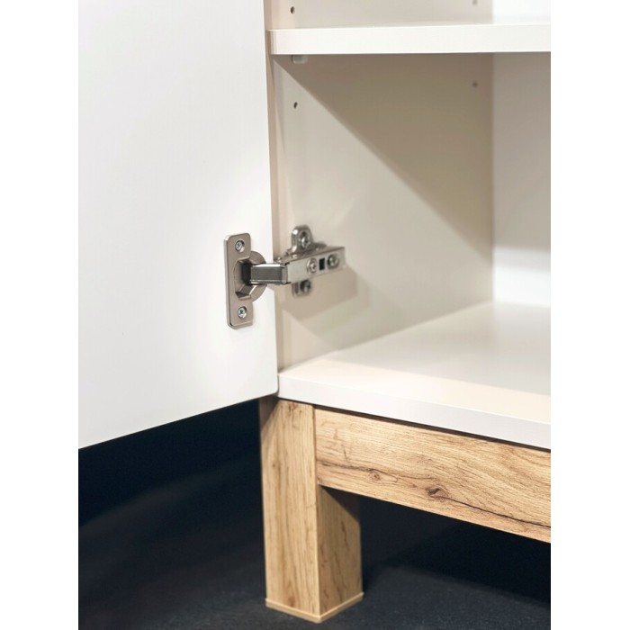 Zoom sur l’ouverture de la porte du meuble de rangement ERMANO cachemire à poser