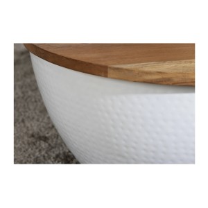 Zoom sur la jonction entre le plateau et la structure de la table basse ronde TRIANE 60cm blanche et bois
