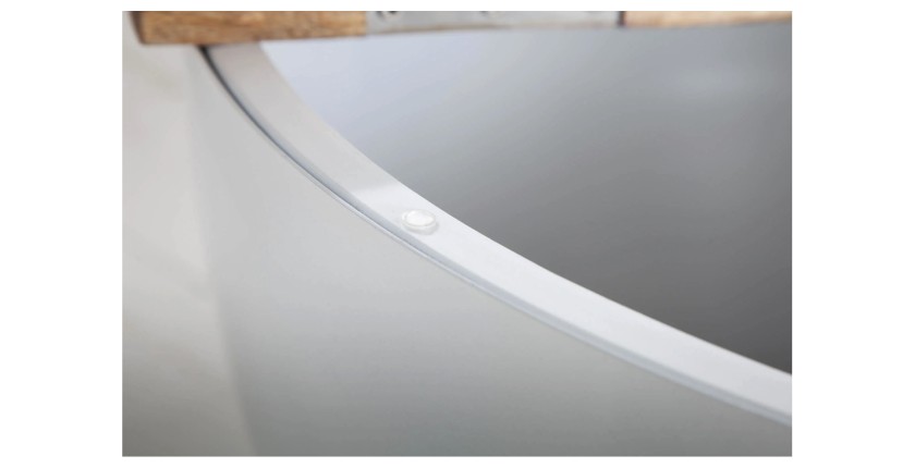 Zoom sur l'ouverture du plateau de la table basse TRIANE ronde 60cm blanche et bois clair