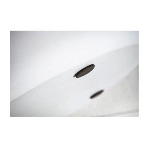 Zoom sur les patins de la table basse TRIANE ronde 60cm blanche et bois clair