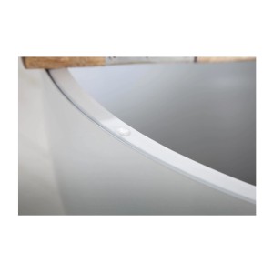 Zoom sur l'ouverture du plateau de la table basse TRIANE blanche et bois ronde 70cm