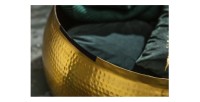 Zoom sur l'intérieur de la table basse TRIANE dorée 70cm ronde