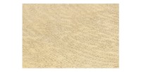Zoom sur la texture du plateau de la table basse TRIANE asymétrique dorée