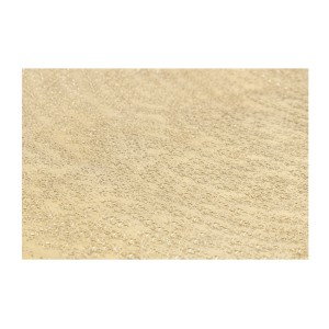Zoom sur la texture du plateau de la table basse TRIANE asymétrique dorée