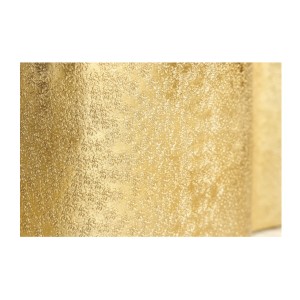 Zoom sur la texture de la structure de la table basse TRIANE asymétrique dorée