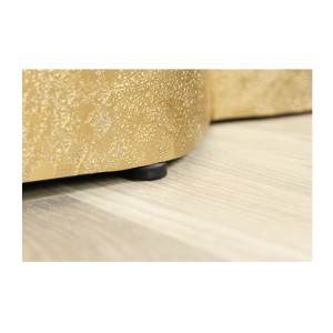 Zoom sur le bord inférieur de la table basse TRIANE asymétrique dorée