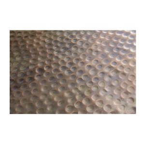 Zoom sur la texture de la table basse TRIANE cuivre ronde 80cm