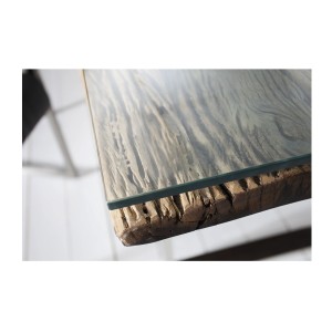 Zoom sur le plateau en verre de la table basse RAFTA 110cm avec plateau en verre