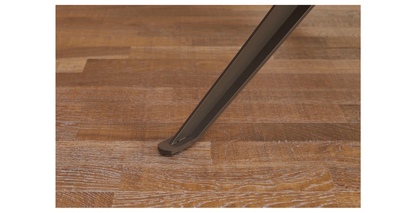 Zoom sur l'un des pieds de la table de salle à manger AVELIS 220cm effet marbre