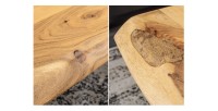 Zoom sur les détails de la table basse ARKAYA en acacia 110cm avec pieds en forme de X noirs