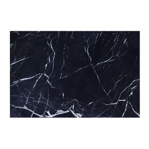 Zoom sur le plateau de la table basse GALEA noire effet marbre